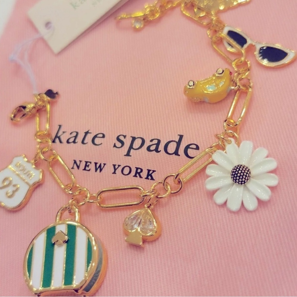 Kate Spade Gold off we go travel charm bracelet NWKate Spade Gold Charm Bracelet